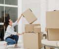 woman-sorting-boxes-after-relocation woman-sorting-boxes-after-relocation